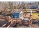 Lakefront dock with seating and a small shed at 604 Beaten Path Rd, Mooresville, NC 28117