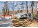 Gray house with red double garage at 604 Beaten Path Rd, Mooresville, NC 28117