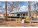 Gray house with red door and landscaping at 604 Beaten Path Rd, Mooresville, NC 28117