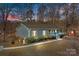 Gray house with a porch and landscaping at 604 Beaten Path Rd, Mooresville, NC 28117
