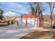 Detached two-car garage with white doors at 604 Beaten Path Rd, Mooresville, NC 28117