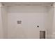 A bright laundry room ready to be outfitted with a washer and dryer and all the needed connections at 625 Colorado Ave # B, Charlotte, NC 28206