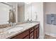 Modern bathroom with double vanity sinks, granite countertops, and neutral walls at 746 Waterscape Ct, Rock Hill, SC 29730