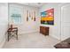 Empty bedroom with an abstract painting and a window for natural light at 746 Waterscape Ct, Rock Hill, SC 29730