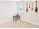 Empty bedroom featuring a side table with a lamp and a window at 746 Waterscape Ct, Rock Hill, SC 29730