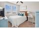 Cozy bedroom featuring natural light, a ceiling fan, and neutral colors at 746 Waterscape Ct, Rock Hill, SC 29730