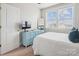 Bedroom featuring dresser, TV, window, and view of the neighborhood at 746 Waterscape Ct, Rock Hill, SC 29730