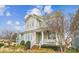 Inviting two-story home featuring a charming front porch and a well-maintained landscape at 746 Waterscape Ct, Rock Hill, SC 29730