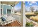 Inviting front porch with swing, featuring a porch swing and manicured landscaping at 746 Waterscape Ct, Rock Hill, SC 29730