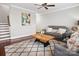 Spacious living room boasts hardwood floors, neutral decor, and a cozy seating area at 746 Waterscape Ct, Rock Hill, SC 29730