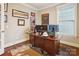 Cozy home office with modern decor, natural light, and a spacious desk at 746 Waterscape Ct, Rock Hill, SC 29730