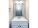 Bathroom featuring a white vanity, stainless steel faucet, and framed mirror at 8272 Golf Ridge Dr, Charlotte, NC 28277