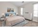 Stylishly staged bedroom with coordinated furnishings and decor, creating a cozy and inviting atmosphere at 8272 Golf Ridge Dr, Charlotte, NC 28277