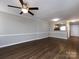 Expansive living room with hardwood flooring and lots of natural light at 8272 Golf Ridge Dr, Charlotte, NC 28277