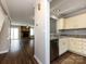 Open layout with fireplace in the living room, connected to the kitchen at 8272 Golf Ridge Dr, Charlotte, NC 28277