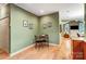 Cozy breakfast nook with light hardwood floors and view of an open floorplan at 8405 Olde Troon Dr # 4A, Charlotte, NC 28277
