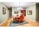 Dining area with chandelier and view into the kitchen at 8405 Olde Troon Dr # 4A, Charlotte, NC 28277