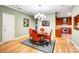 Dining area with chandelier and view into the kitchen at 8405 Olde Troon Dr # 4A, Charlotte, NC 28277