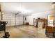Spacious two car garage with concrete floor and extra storage room for all your vehicles and equipment at 8405 Olde Troon Dr # 4A, Charlotte, NC 28277