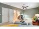Functional home office features a work space, relaxing lounge area, and easy access to adjacent rooms at 8405 Olde Troon Dr # 4A, Charlotte, NC 28277