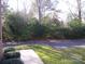 A view of the street and sidewalk in front of the home at 8405 Olde Troon Dr # 4A, Charlotte, NC 28277
