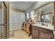 Well-appointed bathroom featuring a sleek vanity, large mirror, and a walk-in tiled shower at 842 Mary Knoll Ct, Rock Hill, SC 29730