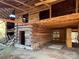 Interior of barn showing exposed beams and log walls at 8725 Bringle Ferry Rd, Salisbury, NC 28146
