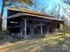 Rustic wooden barn in need of repair at 8725 Bringle Ferry Rd, Salisbury, NC 28146