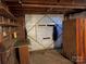 Unfinished basement garage with insulated door at 8725 Bringle Ferry Rd, Salisbury, NC 28146