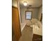 Bathroom with updated vanity, tub, and tile flooring at 8725 Bringle Ferry Rd, Salisbury, NC 28146