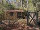 Small brick shed with gated entry, ideal for storage at 8725 Bringle Ferry Rd, Salisbury, NC 28146