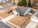 Aerial view of a single-Gathering home featuring a two-car garage, fenced yard, and mature trees at 10238 Highland Creek Cir, Fort Mill, SC 29707