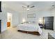 Relaxing main bedroom with a king-size bed, ceiling fan, ensuite bathroom, and walk-in closet at 10238 Highland Creek Cir, Fort Mill, SC 29707