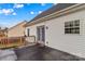 Exterior view of the back deck showcasing the door leading indoors at 103 Granville Ln, Salisbury, NC 28146