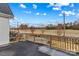 Exterior view of the back deck showcasing the above ground pool and wooded backyard at 103 Granville Ln, Salisbury, NC 28146