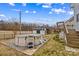 Backyard featuring an above-ground pool, storage shed and mature landscaping at 103 Granville Ln, Salisbury, NC 28146