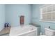 This bathroom features a soaking tub with tile surround, granite counters, and a modern toilet at 103 Granville Ln, Salisbury, NC 28146