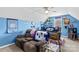 The bonus room features a Carolina Tarheels theme with a large reclining sofa at 103 Granville Ln, Salisbury, NC 28146