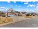 Charming exterior view of a home with a large driveway and well-maintained lawn on a sunny day at 103 Granville Ln, Salisbury, NC 28146