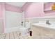 Bathroom with tub, toilet, and vanity at 115 E Geroid St, Salisbury, NC 28144