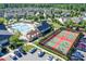 Aerial view of the community pool, tennis courts, and clubhouse, offering an active and social lifestyle at 11508 Dublin Crescent Rd, Cornelius, NC 28031