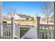 Inviting front porch view with decorative flower planters and a glimpse of the home's exterior at 11508 Dublin Crescent Rd, Cornelius, NC 28031