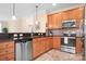 Well-equipped kitchen featuring stainless steel appliances and granite countertops at 11508 Dublin Crescent Rd, Cornelius, NC 28031