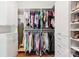 Organized walk-in closet with custom shelving and ample storage space at 117 Cove Pointe, Mount Holly, NC 28120