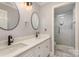 Double vanity bathroom with marble countertops at 121 Quality Dr, Mount Holly, NC 28120