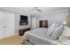 Comfortable bedroom with a king-size bed, TV, and fireplace at 121 Quality Dr, Mount Holly, NC 28120