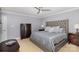 Bright bedroom featuring a king-size bed and ample closet space at 121 Quality Dr, Mount Holly, NC 28120