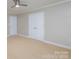 Bedroom with double doors and neutral decor at 121 Quality Dr, Mount Holly, NC 28120