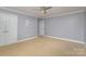 Spacious bedroom with neutral walls and carpet at 121 Quality Dr, Mount Holly, NC 28120