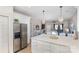 Modern kitchen with white cabinets, stainless steel appliances and a large island at 121 Quality Dr, Mount Holly, NC 28120